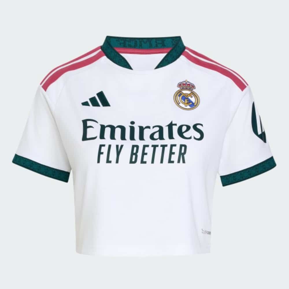 Camiseta Corta del Real Madrid Mujer 2027 4 Camiseta oficial mujer Real Madrid 2027 primera equipación, corte corto por encima de la cintura, color blanco clásico.