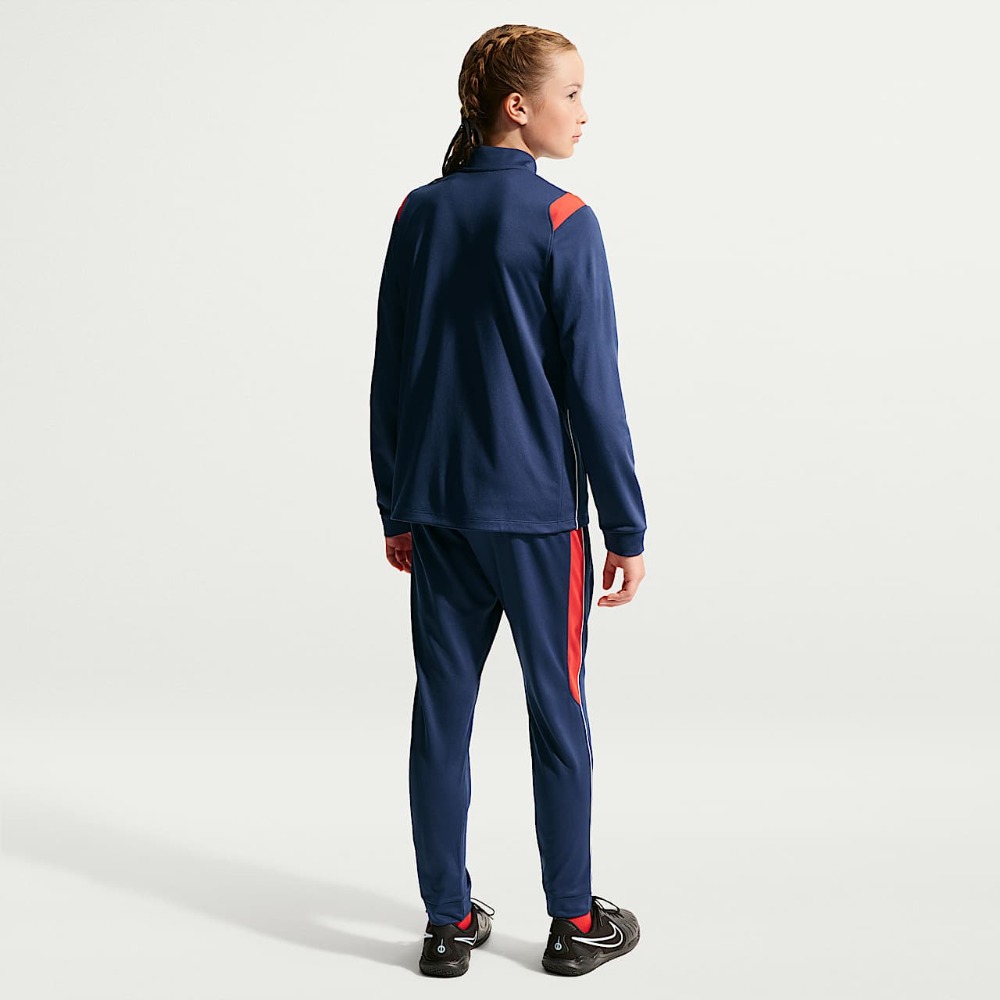 Chándal Niño Paris Saint-Germain 26/27 7 Chándal de fútbol para niño del Paris Saint-Germain, temporada 2026/2027. Conjunto oficial de la primera equipación.