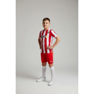 Camisetas del Almería 6 Primera equipación oficial de la UD Almería para niño de la temporada 2026/27. Camiseta y pantalón rojiblancos.