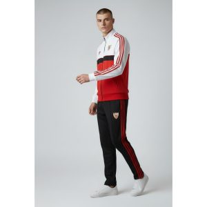Chándal oficial del Sevilla FC para la temporada 2026/27. Conjunto de chaqueta y pantalón de la primera equipación de adulto.
